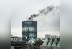 Berlin’s landmark Europa-Center tower on fire